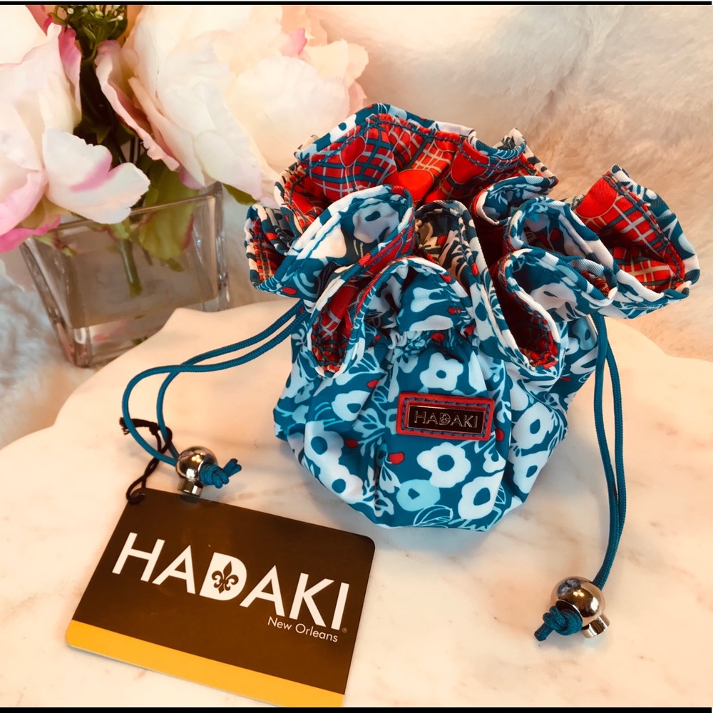 HADAKI “BERRY BLOSSOM TEAL” JEWELRY BAG